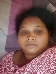 An amazing mature woman undresses in an old house