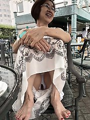 Curvy mature mama is fingering her dripping twat