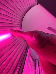 A very sexy woman is naked in these photographs.